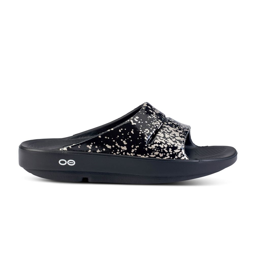 Limited Edition OOFOS Women's OOahh Slide in Black / Champagne Pop