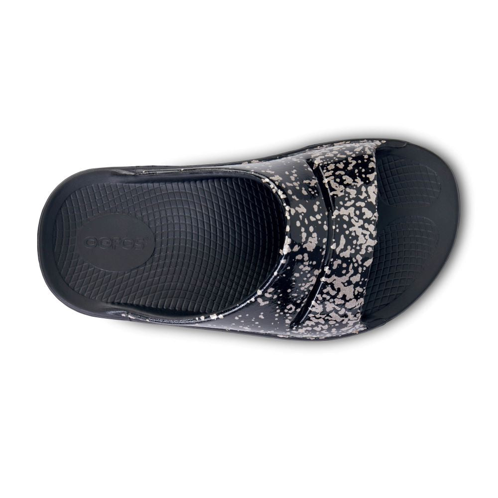 Limited Edition OOFOS Women's OOahh Slide in Black / Champagne Pop