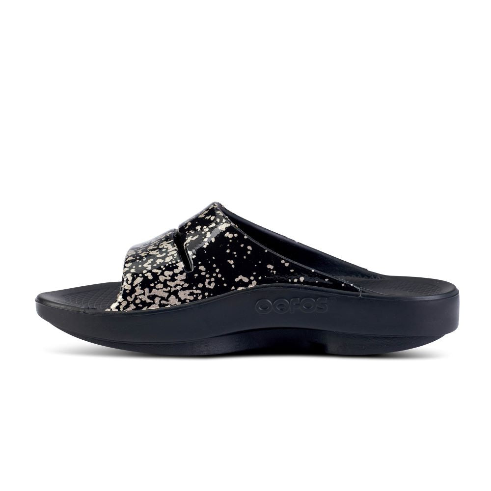 Limited Edition OOFOS Women's OOahh Slide in Black / Champagne Pop